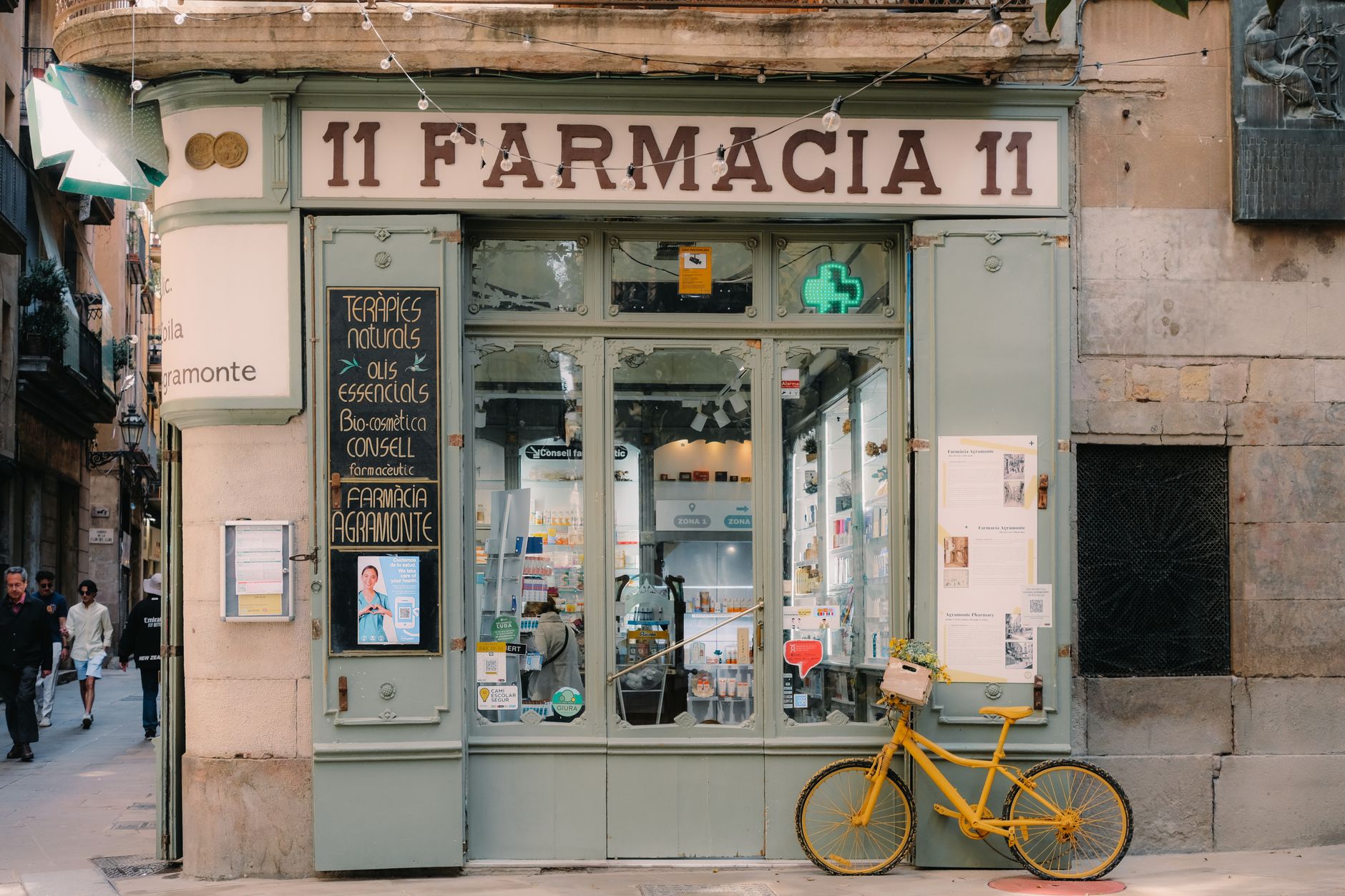A pharmacy storefront on a neighborhood street