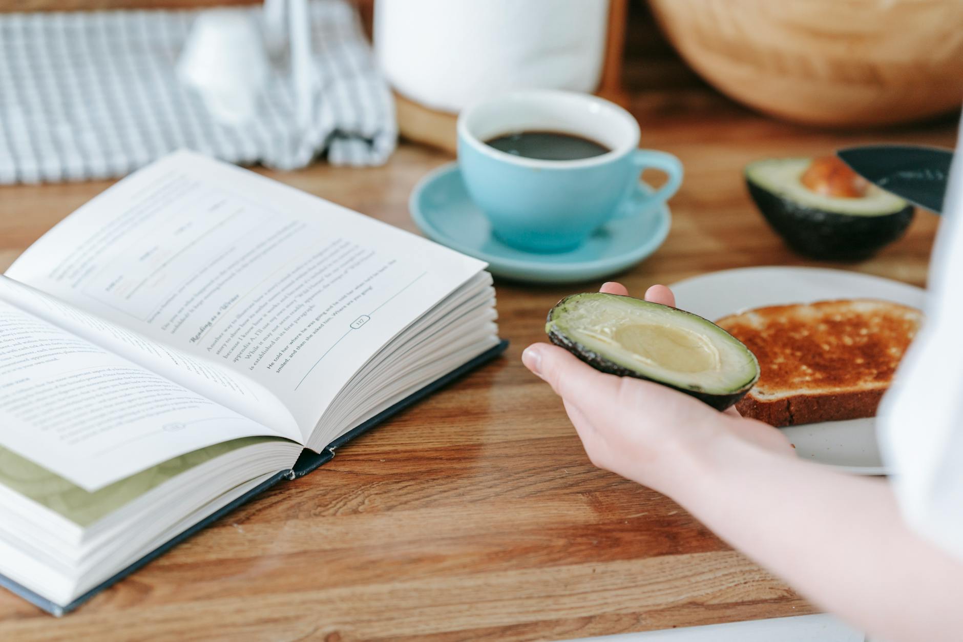 Avocado toast and coffee on a brunch table