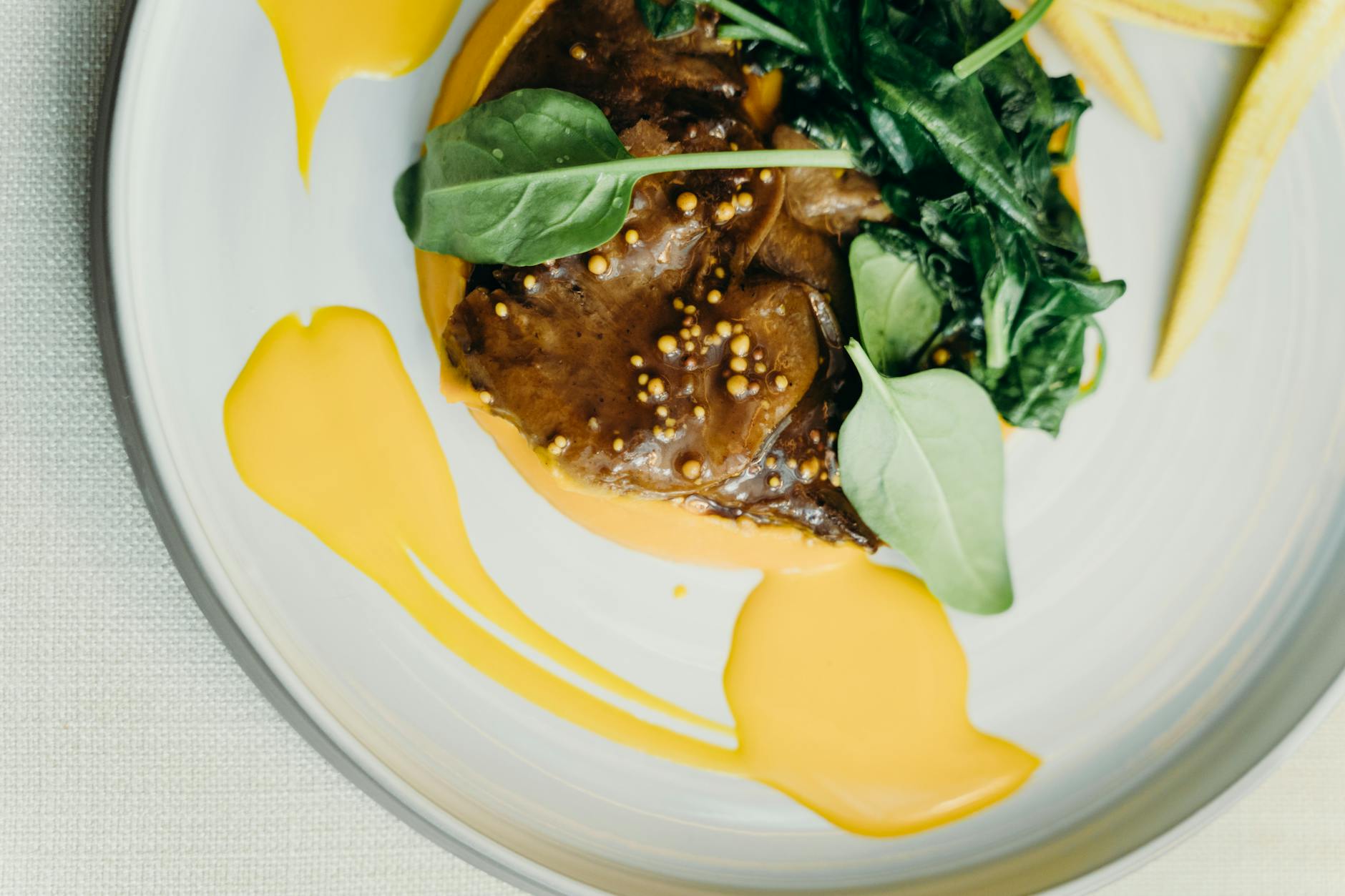 A gourmet plated dish at an upscale restaurant