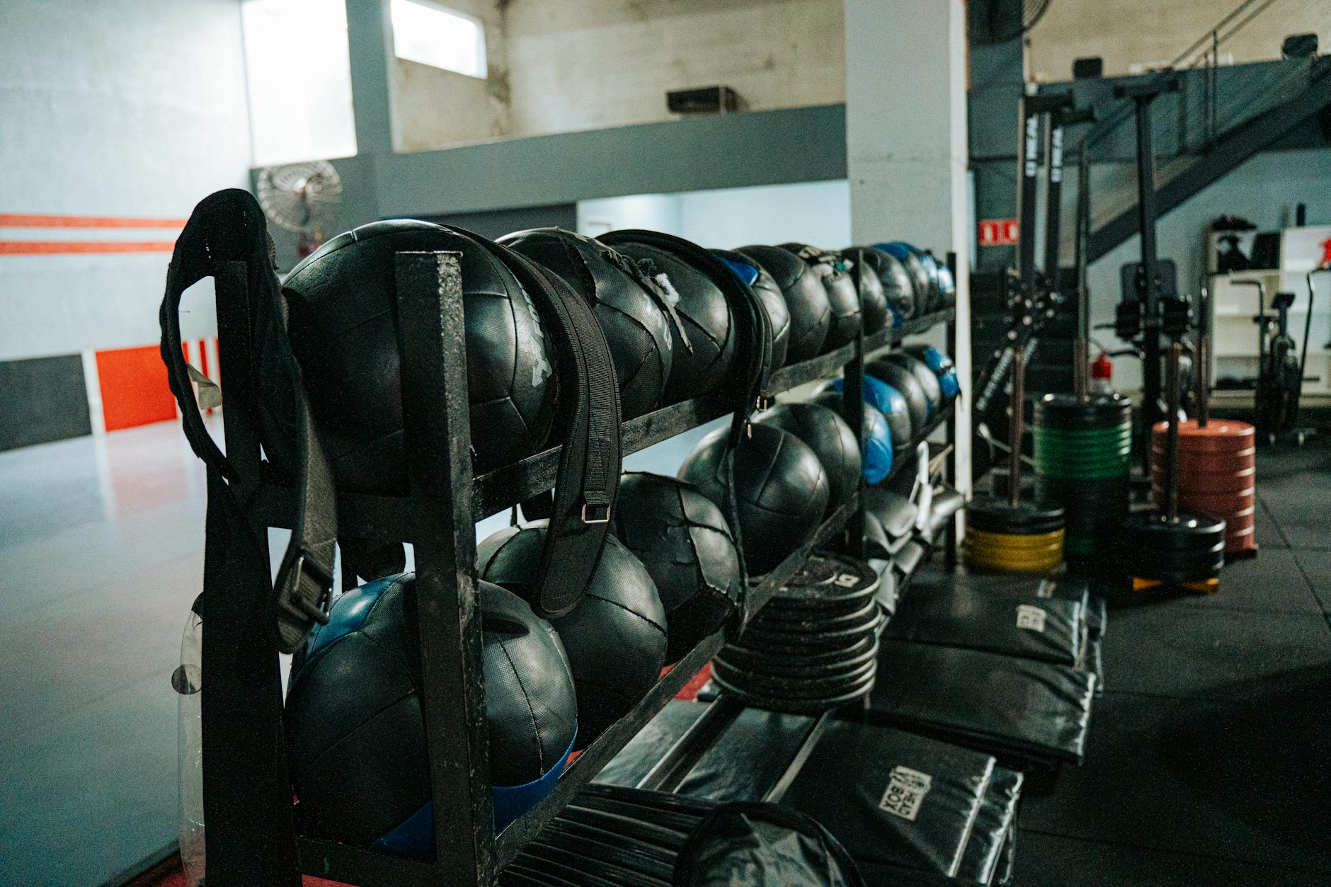 A well-equipped boutique gym with weights and equipment
